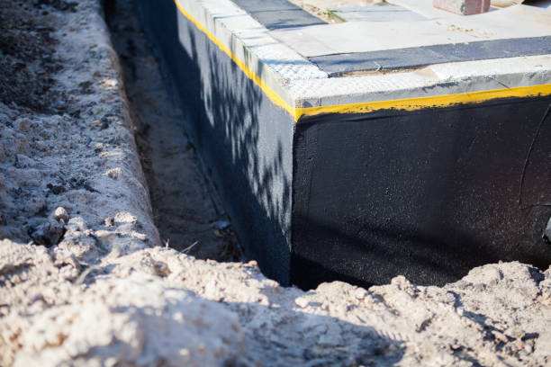 Professional Basement Waterproofing technician working in Martinsville, NJ